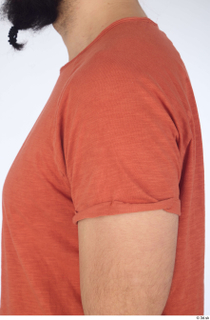 Turgen casual dressed orange t-shirt shoulder upper body 0001.jpg